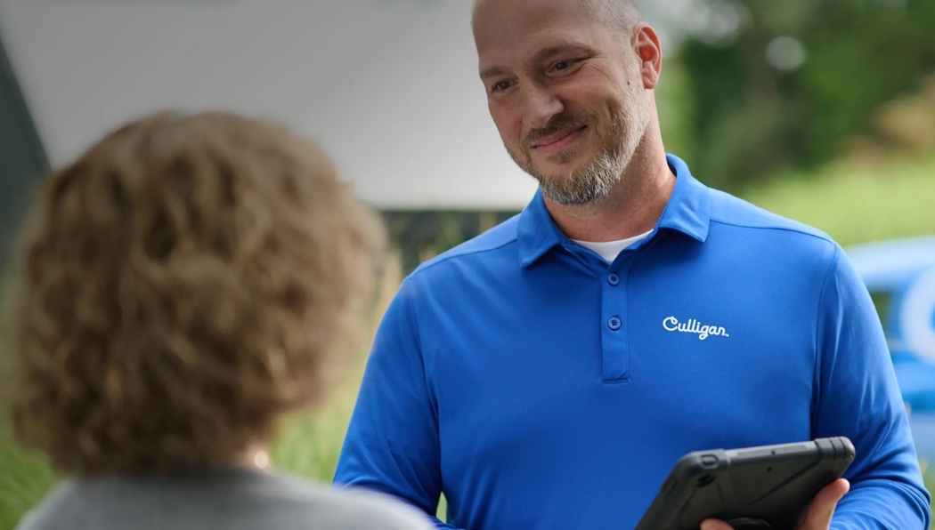 commercial culligan expert with culligan van